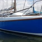 The hull and decks are in good, but not perfect, condition - starboard side