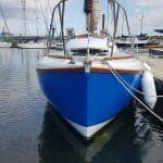 The hull and decks are in good, but not perfect, condition - port side