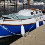 The hull and decks are in good, but not perfect, condition - port side