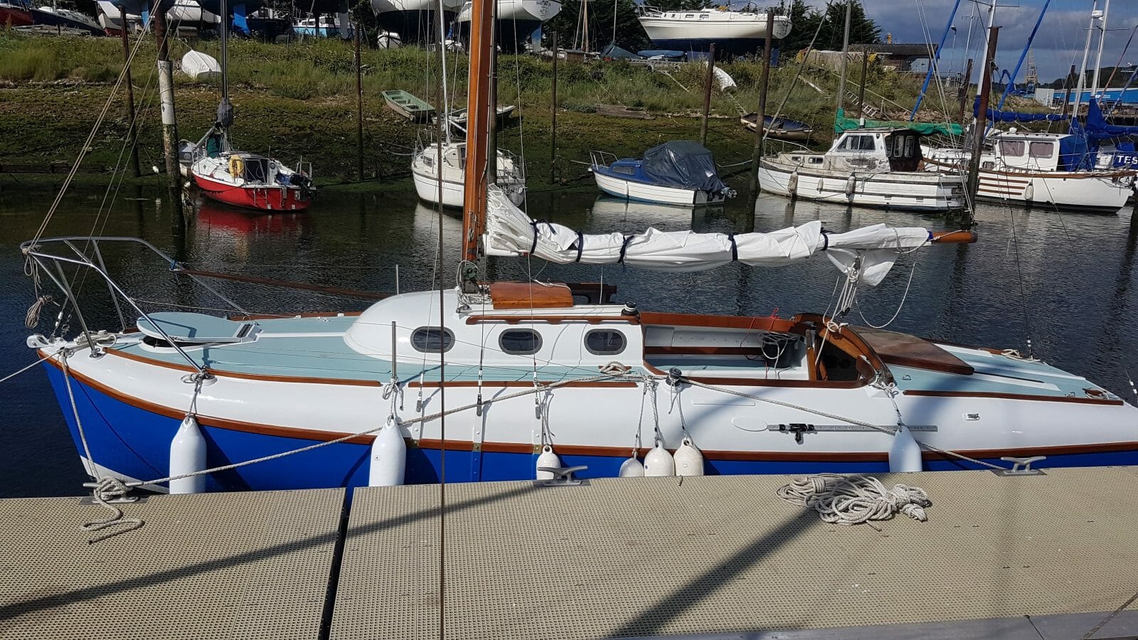 The hull and decks are in good, but not perfect, condition - port side