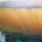 The varnish on the hull still visible where the covers had been.