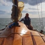 The happy Skipper at the helm. Not enough wind for sailing sadly.