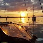 Motoring up the River Orwell as the sun sets.