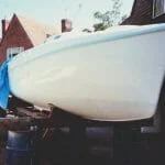 A86 1990 On the drums....Showing epoxy on underside, and respray of hull.