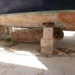A102 in Sardinia - keels out and preparing the bottom for copper coat