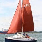 A60 sailing well with her very distinctive brown sails.