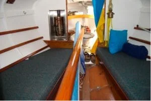 Simple fit out in the fore cabin with a charcoal stove as fitted to a few Atalanta. Early 2000s