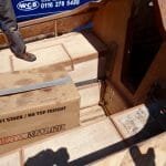 The cockpit. New everything including the bottom of the main bulkhead. The cardboard box hides the new engine.