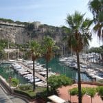 The small yacht harbour with Old Monace on the cliff top