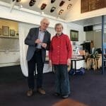 Vice Commodore Jane presents the Commodore with his award for the restoration of A1