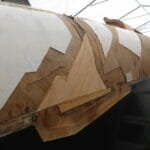 The first laminate layer back on the deck and hull.